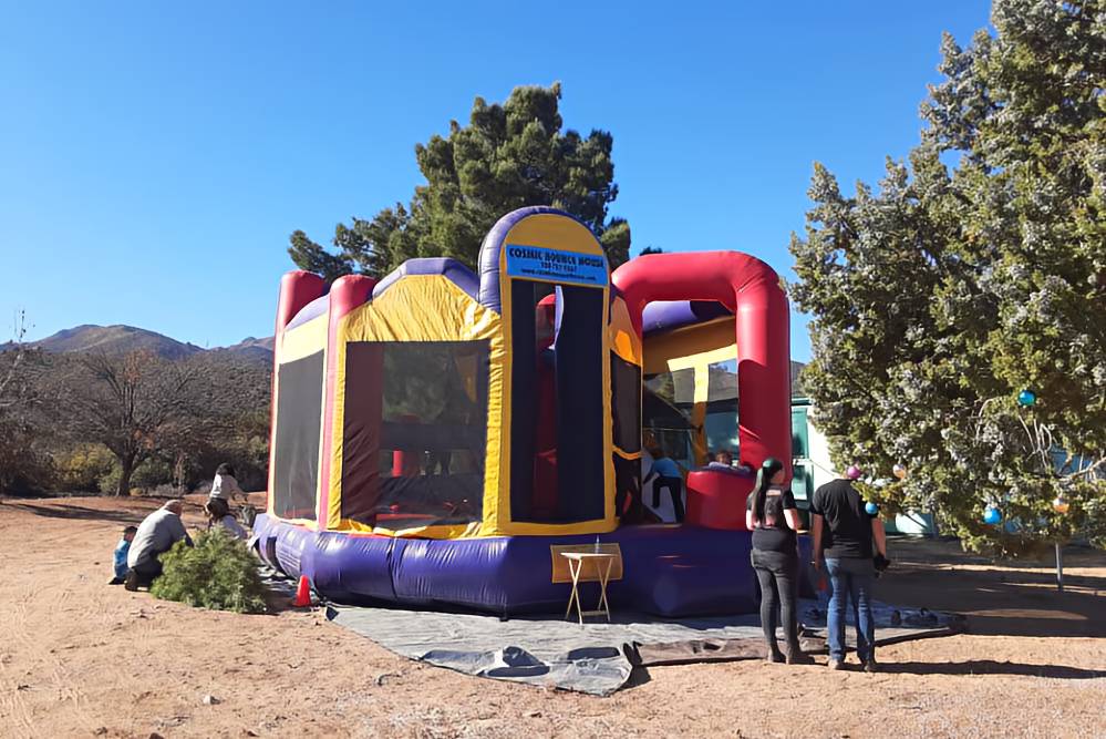 Bouncy House at Annual Cut Your Own Christmas Tree Event at M&D Trees